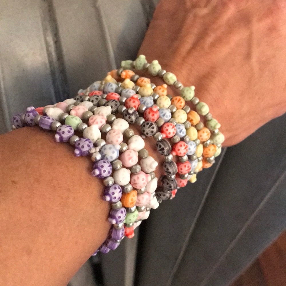 10 ladybug stretch braceletss! Selling as set